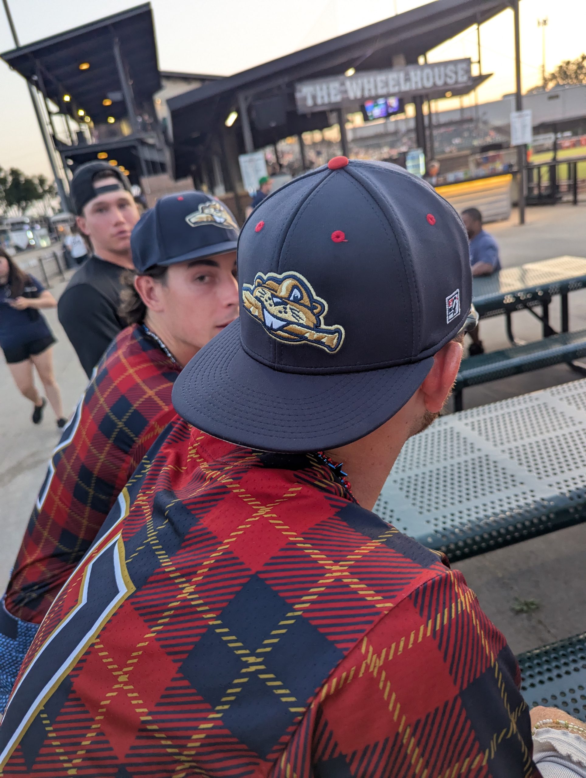 USPBL Beavers players wearing Batting Practice BP baseball caps from The Game, navy with beaver mascot logo